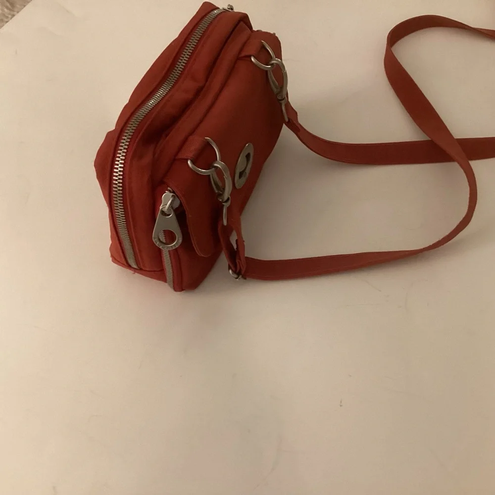 Baggallini Crossbody Bag Red with Orange interior. - Picture 2 of 5